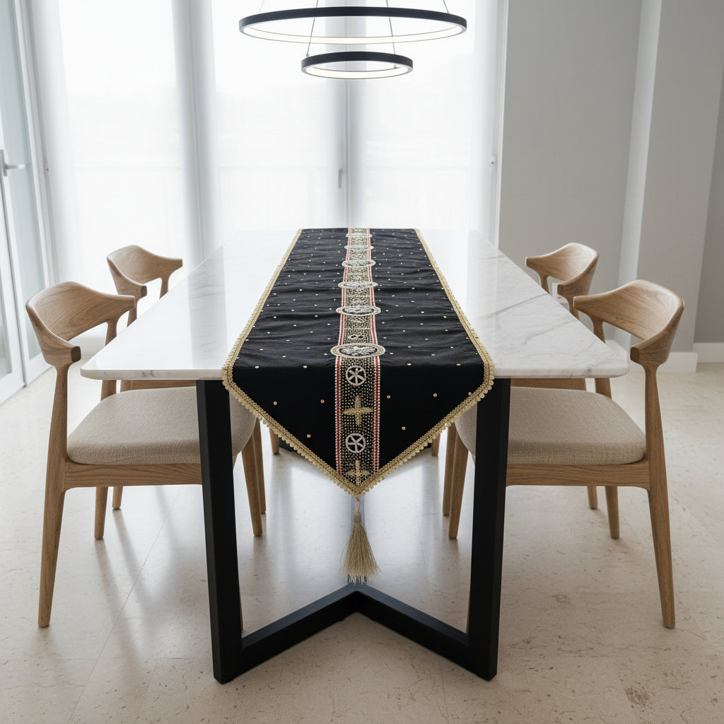 Decorative table runner with intricate patterns on a wooden surface.