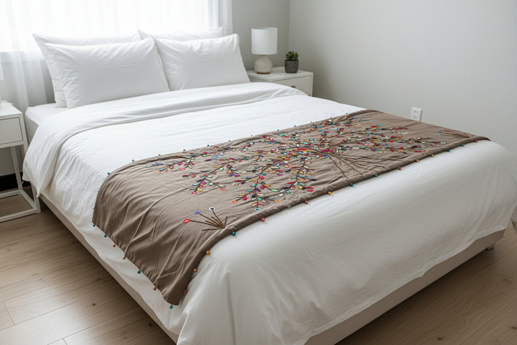 Textile with colorful tree design on a dark background